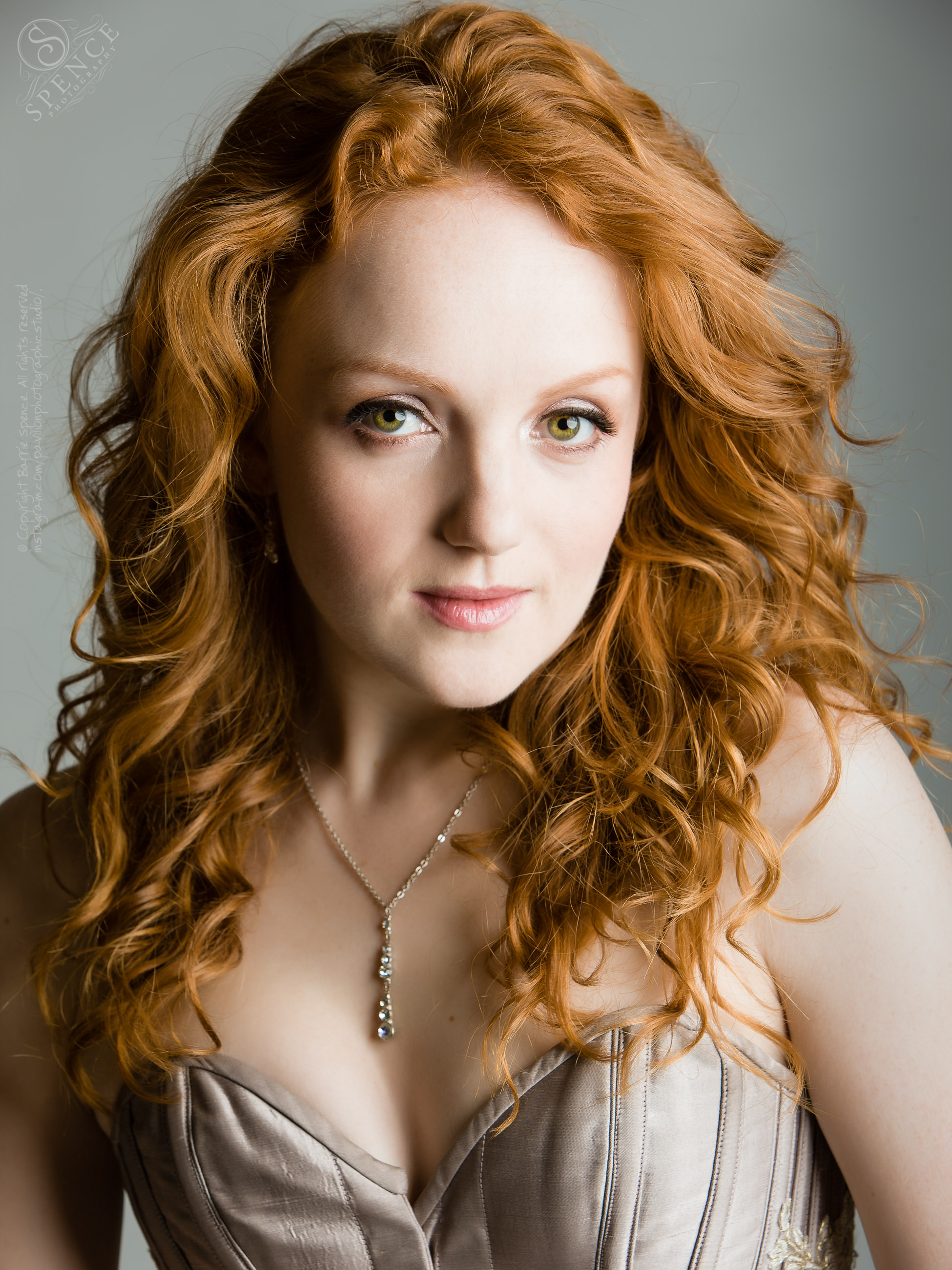 Ivory Flame (portrait wearing corset) - Bowens Octa90 Ivory Flame (portrait wearing corset) / © Copyright 2012 Barrie Spence. All rights reserved.